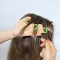Perlen ins haar flechten